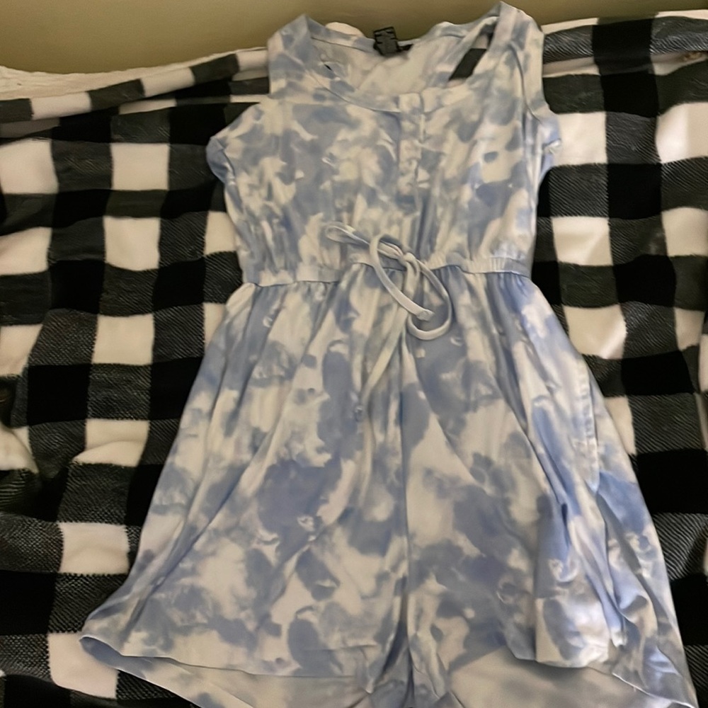 it's a romper from rue21. It's a light blue and white
